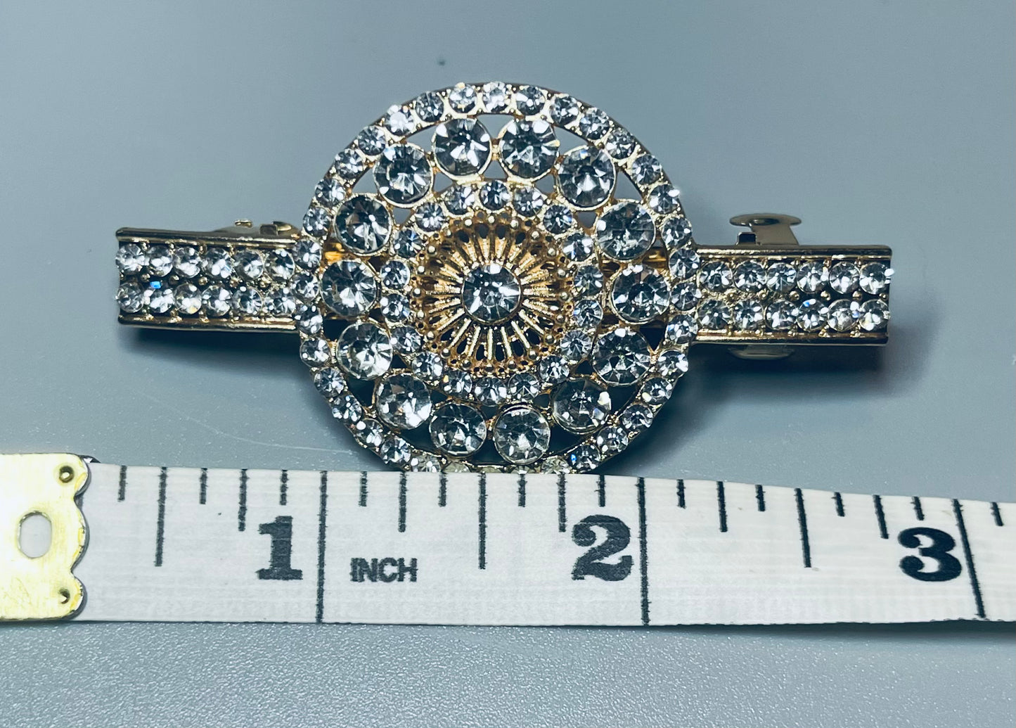 Round flower hair barrette 3.0” inch gold toned with clear rhinestones hair accessory